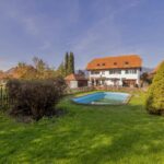 Spannendes Dreifamilienhaus mit Bauland | IMMOSEEKER.CH